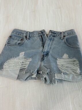 Vintage Levi's Light Blue Distressed Denim Cutoff Shorts